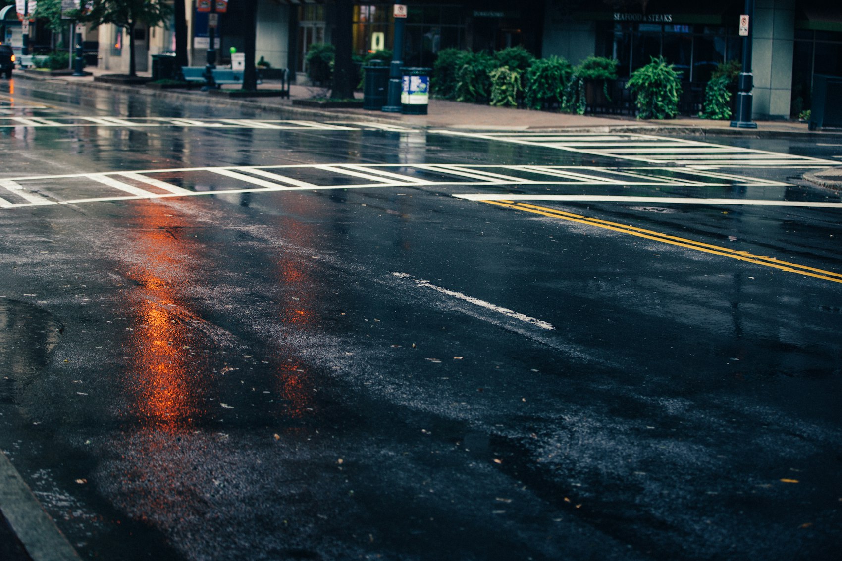 A wet Toronto street at night